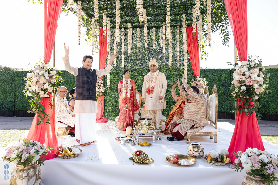 Bride and groom at a decorated mandap