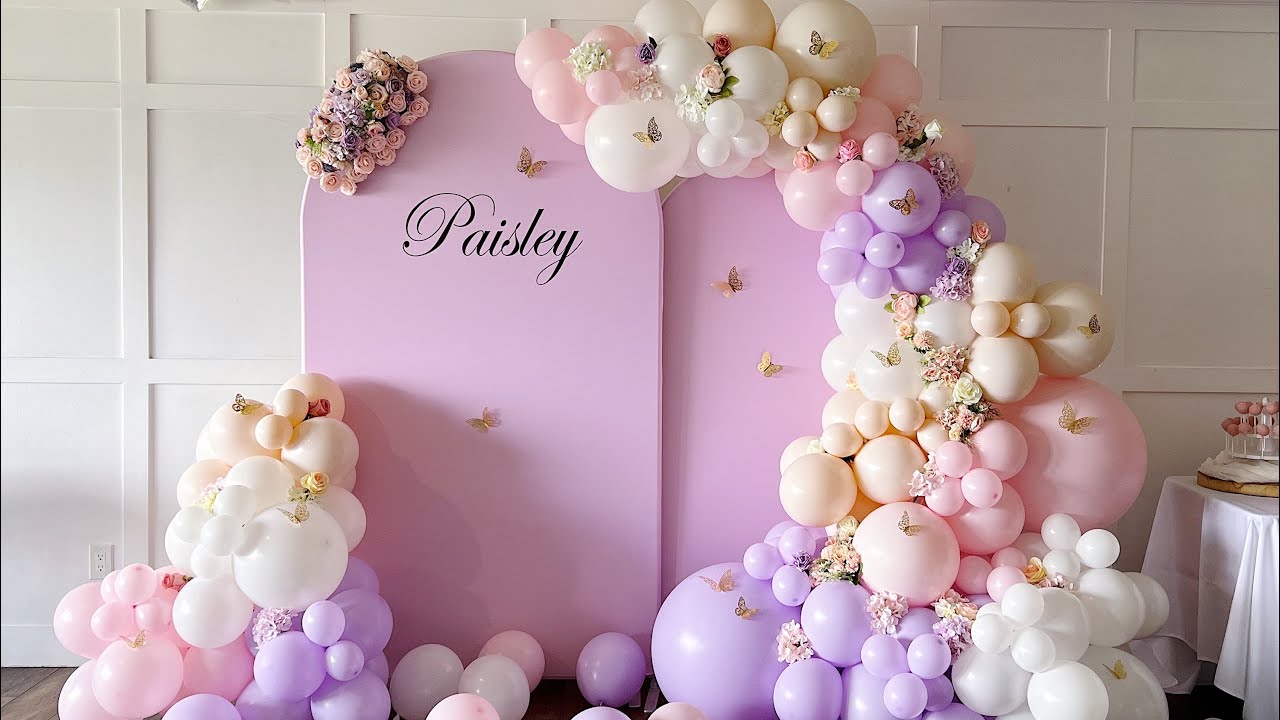 Baby shower setup with pastel balloons